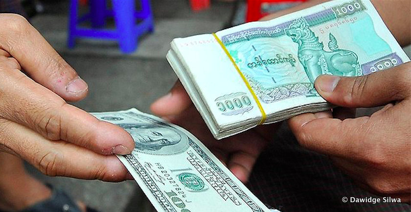 Myanmar kyat and US dollar notes